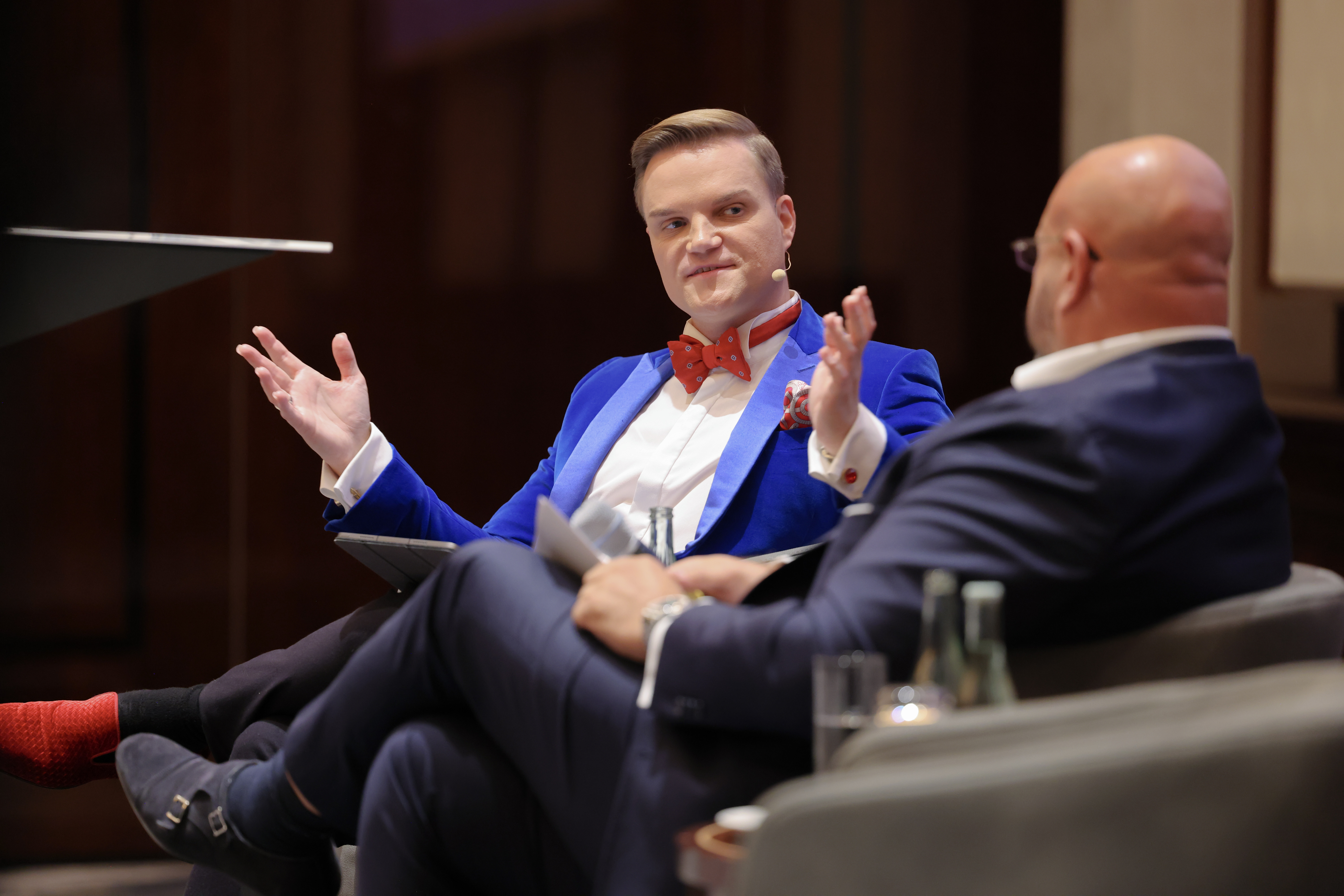 A moderated conversation on stage at the International Wealth Forum 2025